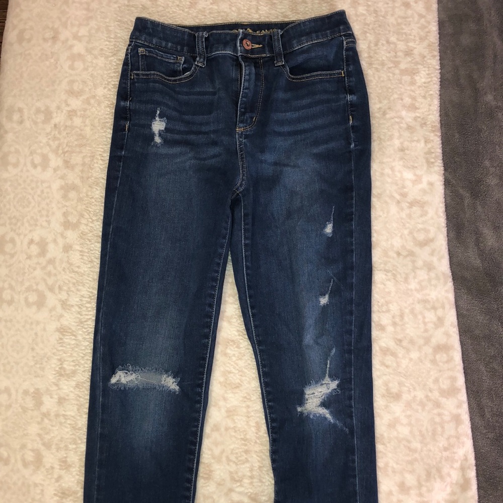 High rise distressed skinny jeans.